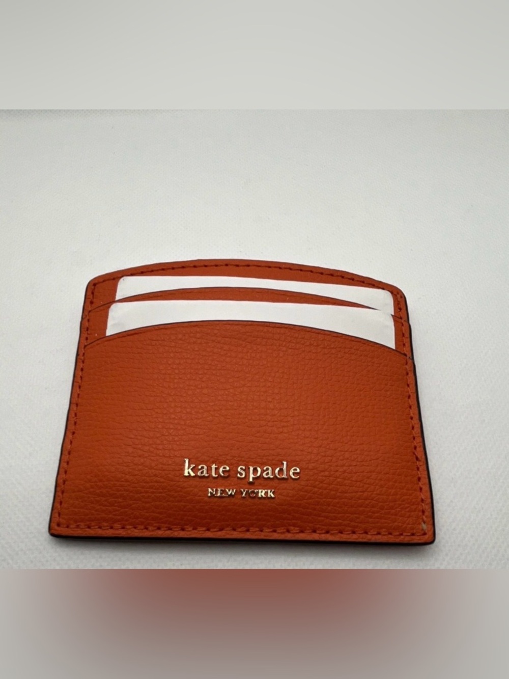 kate spade Orange Leather Slim Card Holder with Gold Logo